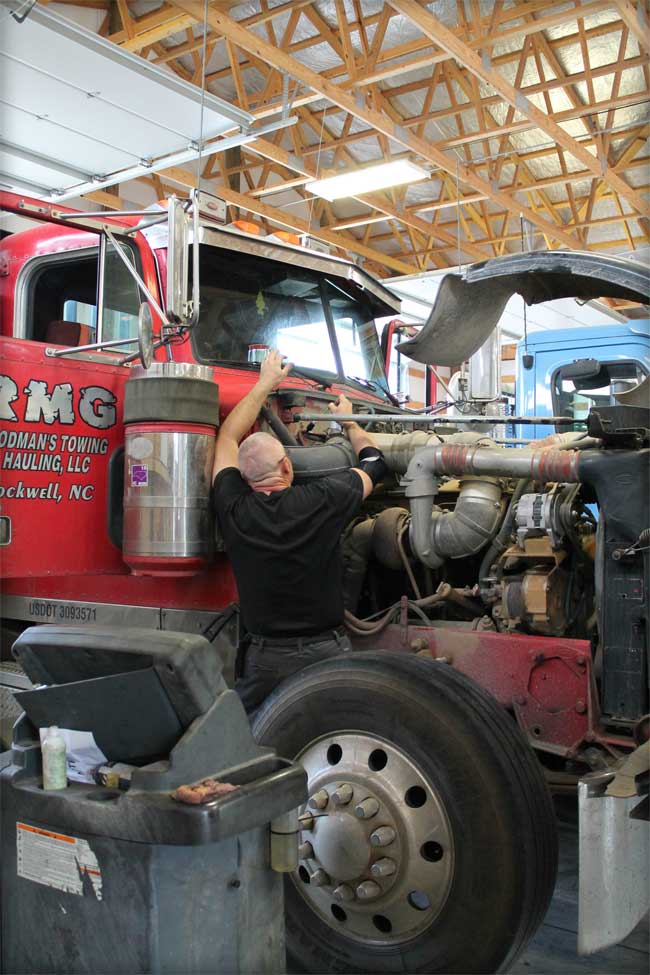 Man doing Truck Diagnostics